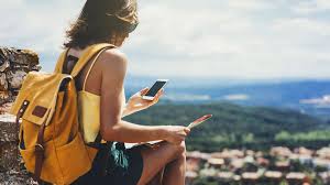 travel gadets in 2025 girl with phone